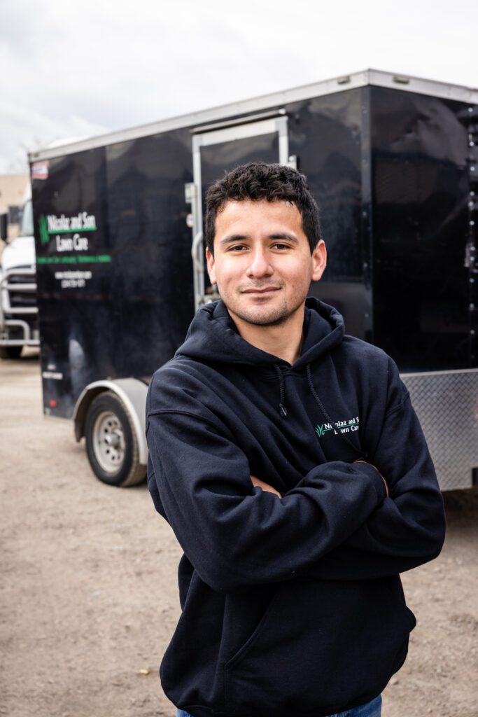 A picture of a man wearing a black hoodie